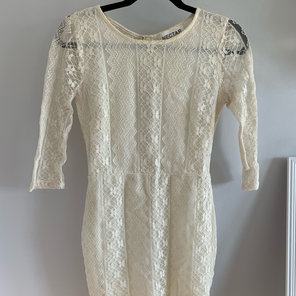 Short White lace dress w/ long sleeves & open back
